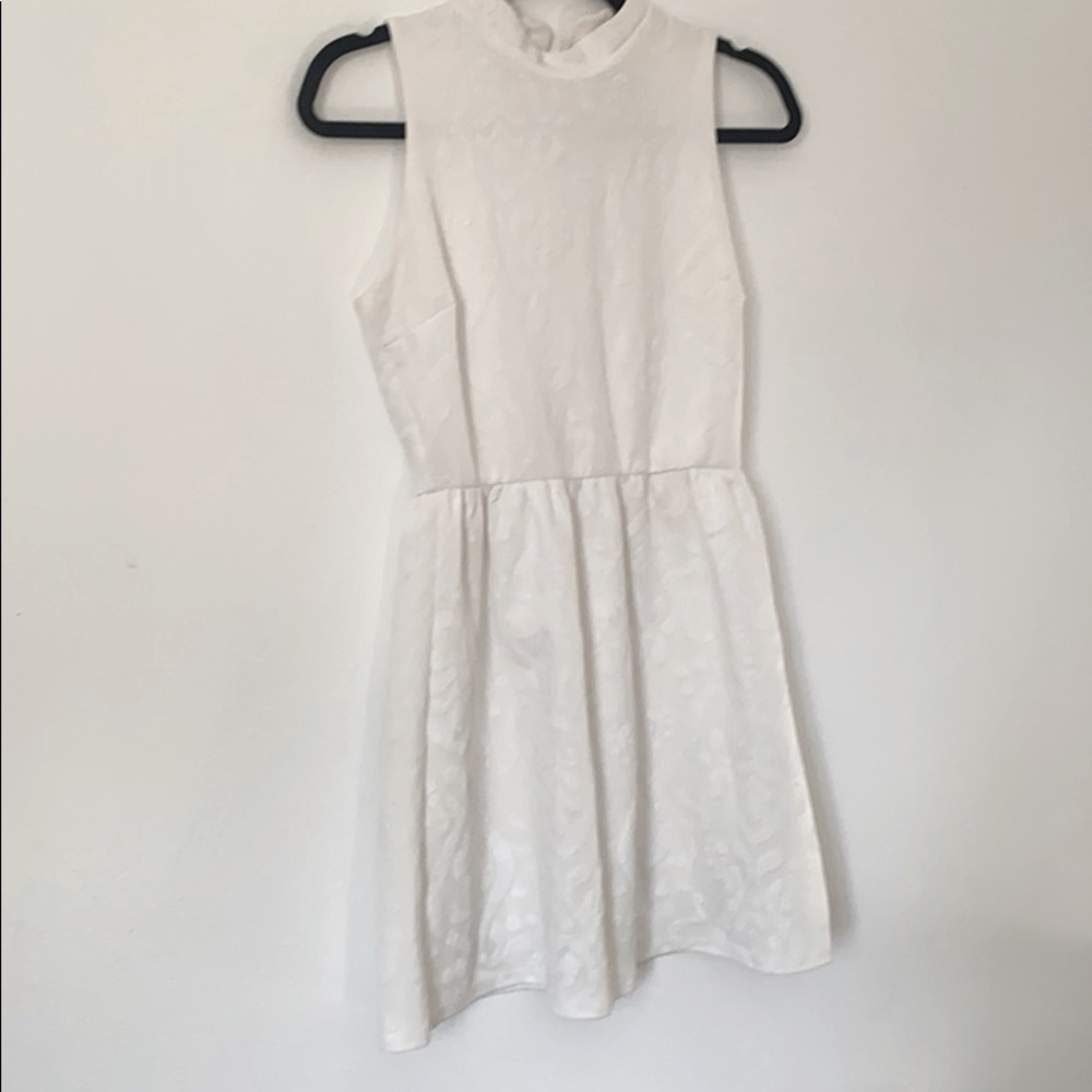 Sleeveless white dress